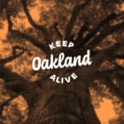 Keep Oakland Alive logo atop orange-tinted tree